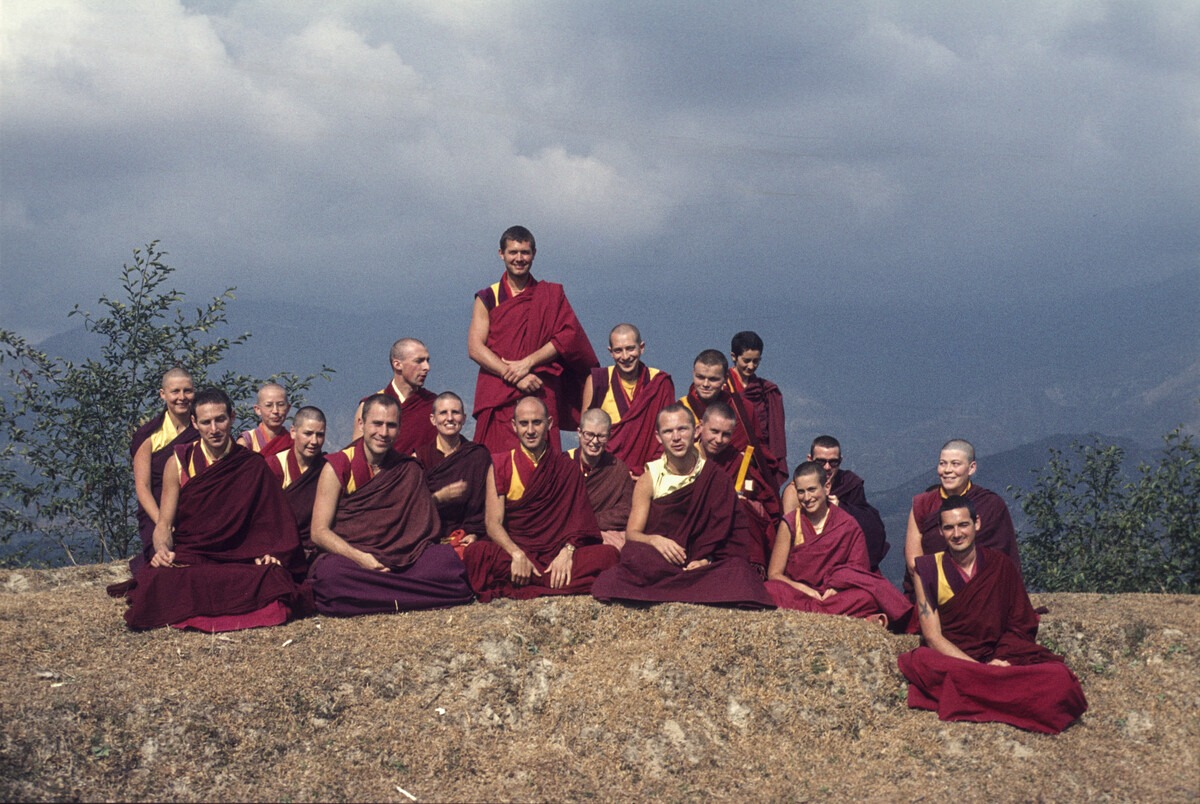 IMI Sangha: Adrian Feldmann (Thubten Gyatso), Elisabeth Drukier, Harry Sutton, Helmut Hohm, Jill Gillies, Jamyang Wangmo (also known as Helly Pelaez or Jampa Chokyi), Karin Valham, Marcel Bertels, Margaret McAndrew, Nick Ribush, Peter Kedge, Roger Kunsang, Roger Wheeler, Wongmo Thubten (Feather Meston), and Yeshe Khadro (Marie Obst), Kopan Monastery, Kathmandu, Nepal, 1977. Photo from the LYWA collection.