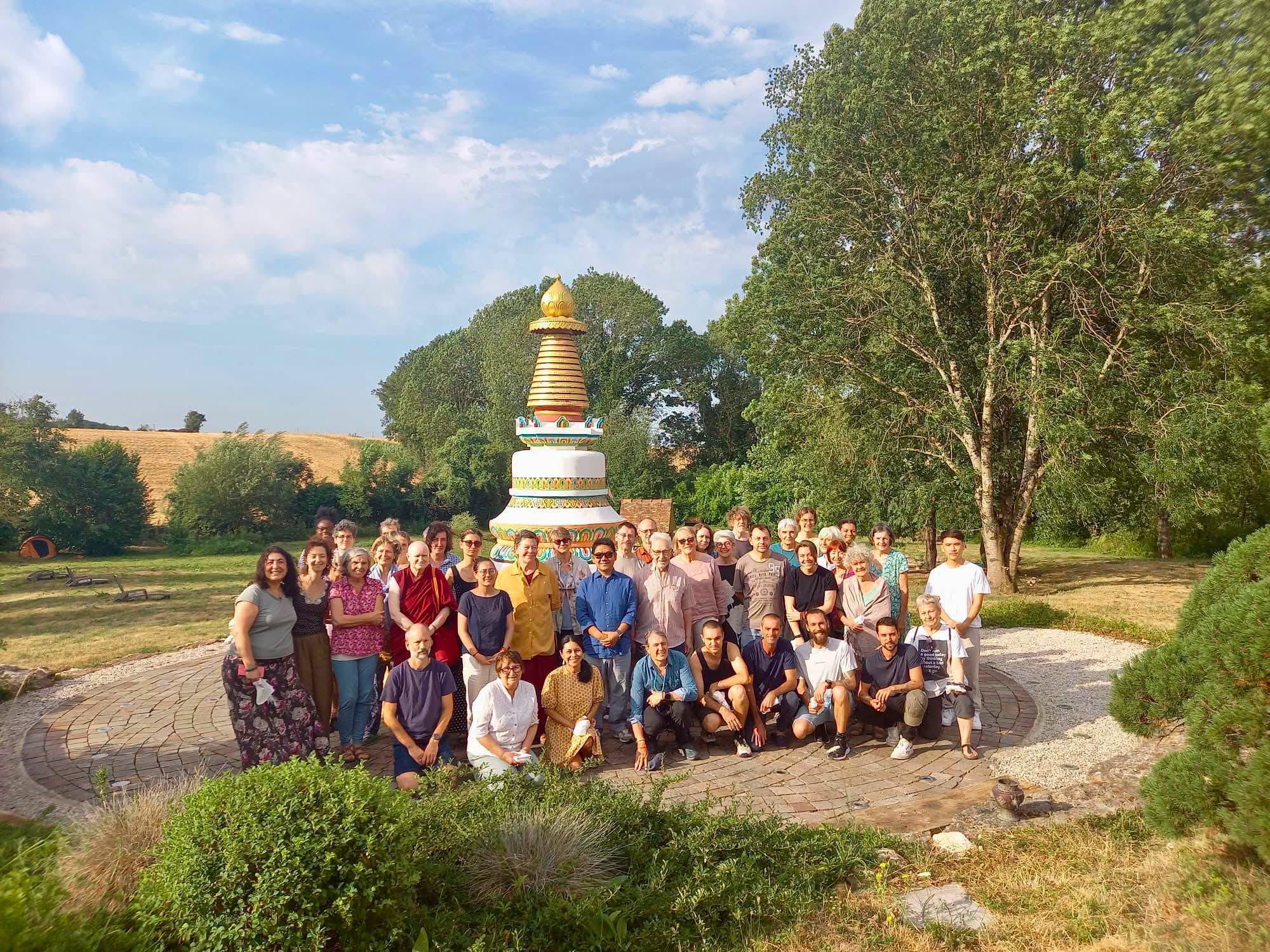 H.E. Serkong Rinpoche, Dr. Berzing and the students at Centre Kalachakra, France, July 2026. Photo by Centre Kalachakra's Facebook Page.