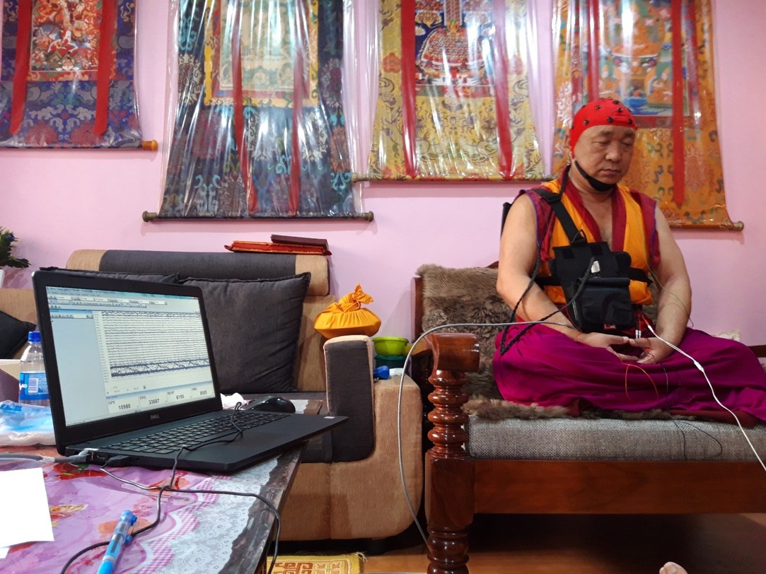 Geshe Gonpo during an EEG recording session at Sera Jey.