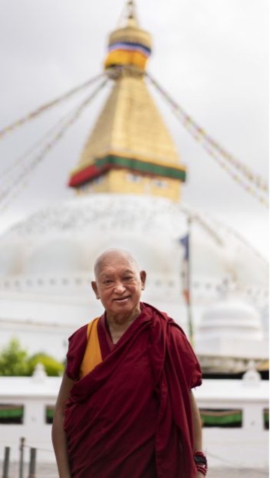 Lama Zopa Rinpoche in front of Boudhanath Stupa, Nepal, June 2021. Photo by Ven. Lobsang Sherab.
