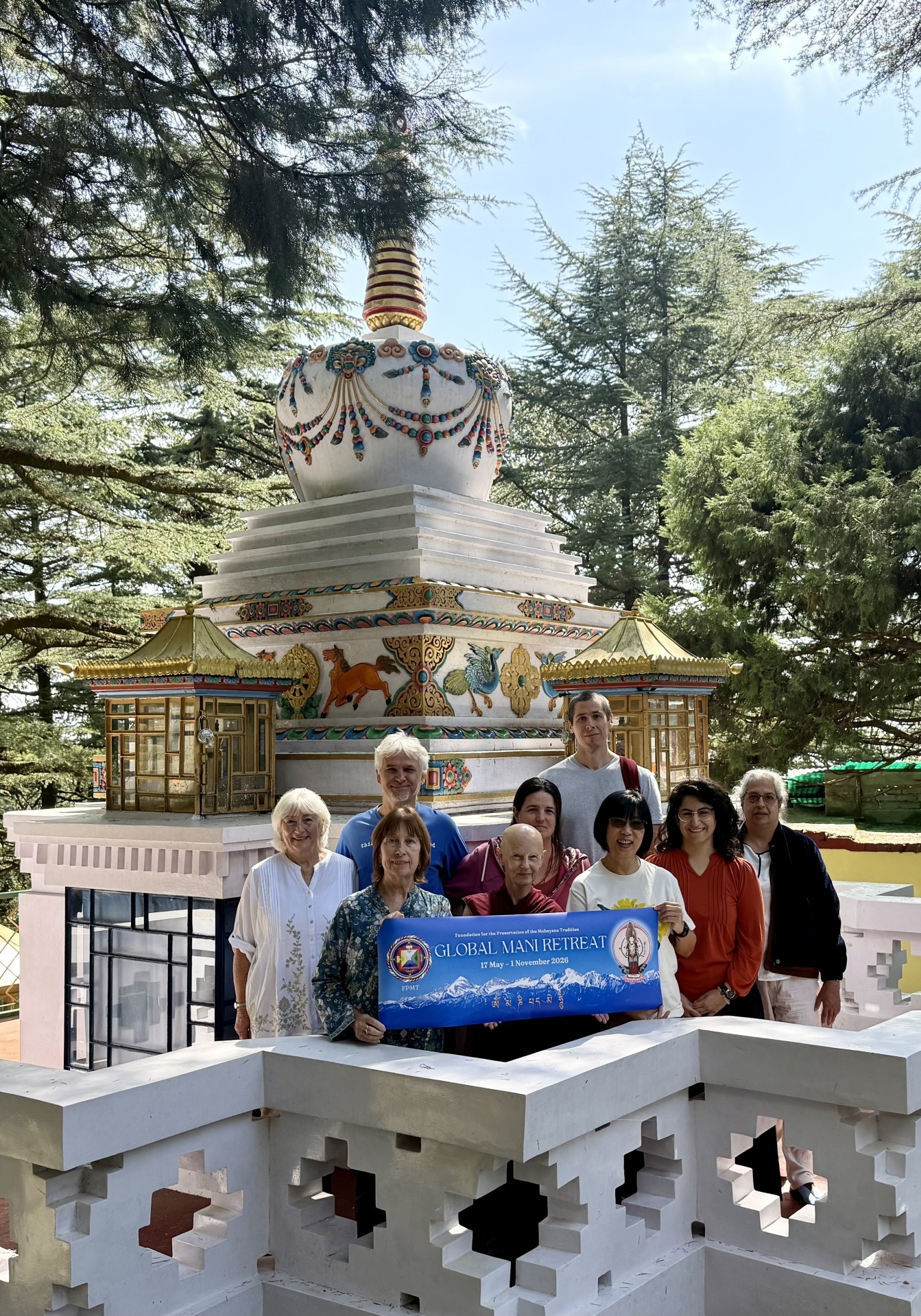 GMR group at Lama Yeshe Memorial Stupa, Tushita, India, October 2026. Photo Courtesy of Global Mani Retreat group.