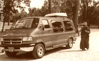 Rinpoche circumambulating the holy objects in his van in Omaha, Nebraska, Wheel Turning Day, August 7