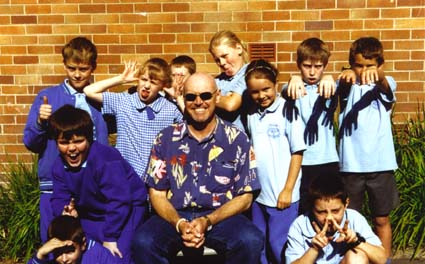 Lou (Thubten Chopel) Ellwood with his students at Blaxland Public School. Photo: Judy Shaw