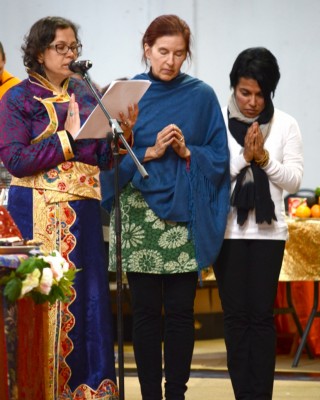 Helen Patrin with Drolkar McCallum and Tara Melwani reads the praises for Lama Zopa Rinpoche offered during the CPMT 2014 long life puja, Australia, September 2014. Photo by Kunchok Gyaltsen.