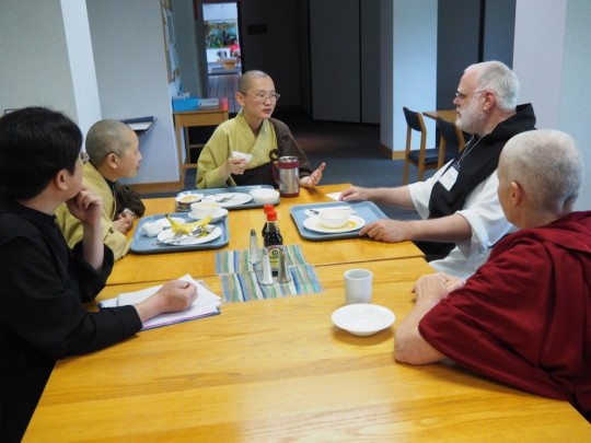 Informal discussion at breakfast during the interfaith gathering, Gethsemani Abbey, May 2015. Photo by Martin Verhoven.