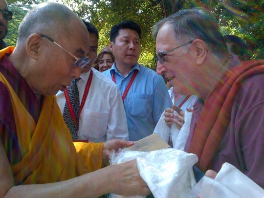 Raanan Kulku presenting a book about the Human Spirit program to His Holiness in Italy, 2014. Photo courtesy of Ven. Sangye Khadro.