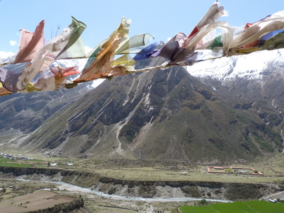 frayed-prayer-flags-flying-over-tsum-nepal-may-2018-photo-by-tsum-pilgrimage-participant