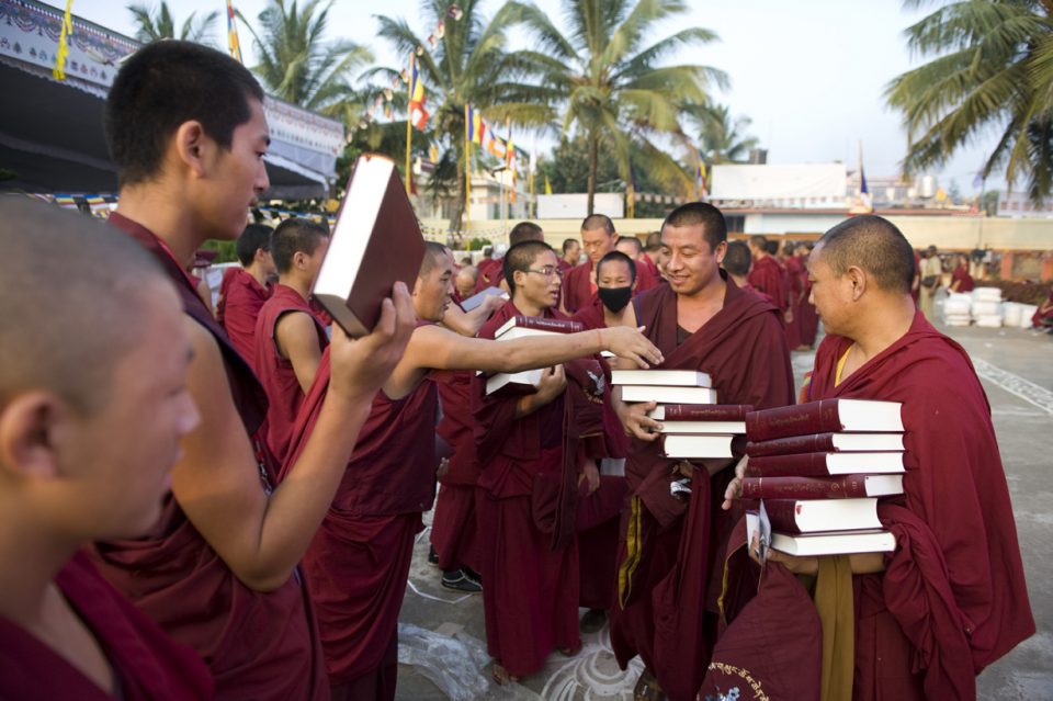 Texts of the 18 Great Lam-rim Commentaries being distributed to Sangha. 