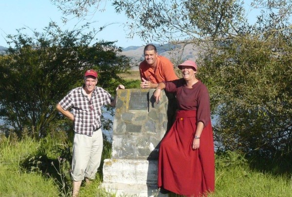 From left to right: Murray Wright, Brian Rae, and Ven. Tenzin Chogkyi. The site where Captain James Cook landed on the Waihou River in 1769, New Zeland, March 2013. Photo courtesy of Murray Wright.