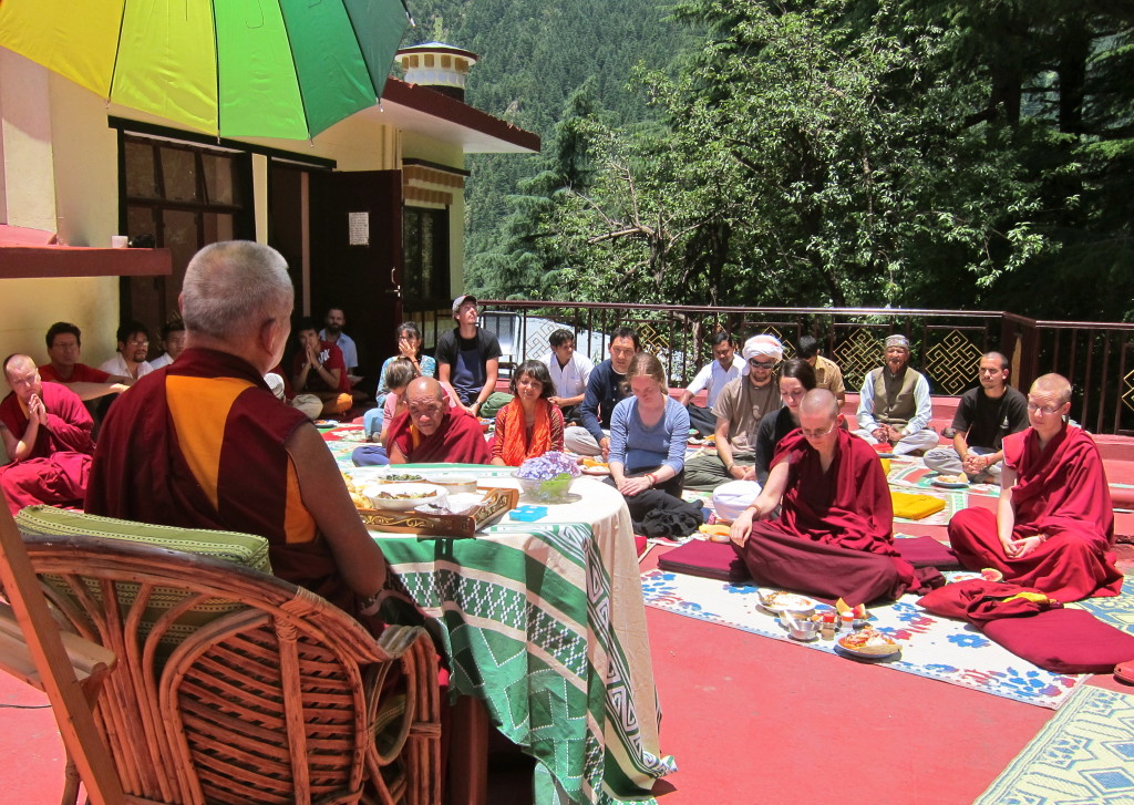 Lama Zopa Rinpoche having lunch with Tushita staff on the roof of the gompa. Tushita. June 18, 2013 Photo by Ven.Sarah Thresher.
