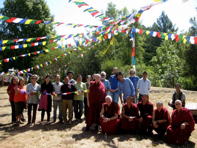 LMB community members after hanging new prayer flags, August 21, 2013. Photo courtesy of LMB's Facebook page.