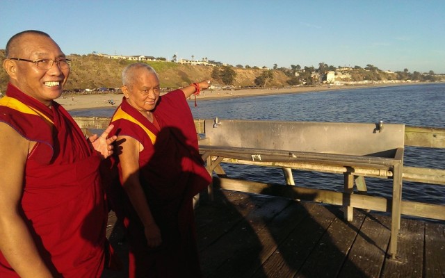 Rinpoche pointing out to Dagri Rinpoche where Lama Yeshe lived. Rinpoche 's house is 
