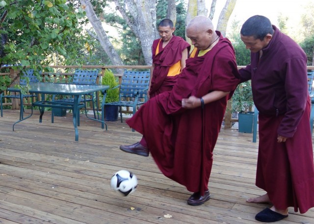 Lama Zopa Rinpoche exercising with a soccer ball, Kachoe Dechen Ling, California, October 2013. Photos by Ven. Roger Kunsang.