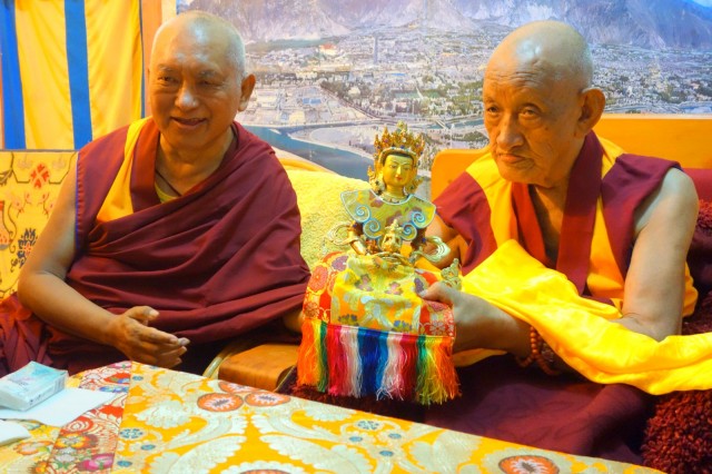 Lama Zopa Rinpoche at dinner with Khensur Rinpoche Losang Tsering, Sera Monastery, India, December 2013. Photo by Ven.Roger Kunsang.