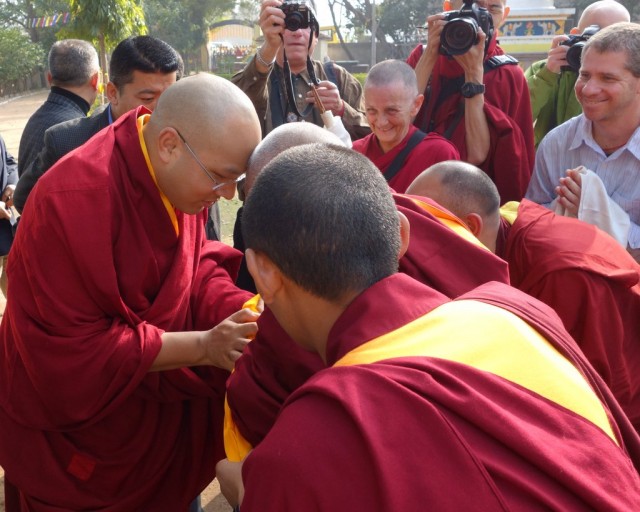 His Holiness the Karmapa greeting Lama Zopa Rinpoche, Root Institute, Bodhgaya, India, January 31, 2014. Photo by Ven. Roger Kunsang.
