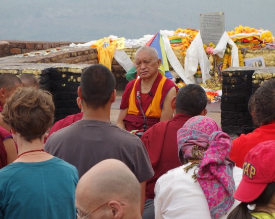Lama Zopa Rinpoche giving an oral transmission of the Vajra Cutter Sutra on Vulture's Peak, India, March 2014. Photo by Ven. Roger Kunsang.