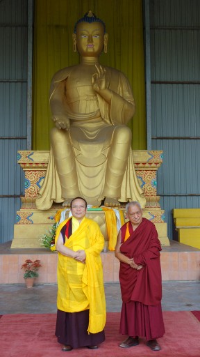Tai Situ Rinopche and Lama Zopa Rinpoche in front of the 24-foot Maitreya Buddha statue, Bodhgaya, India, March 2014. Photo by Ven. Roger Kunsang.