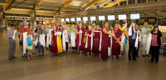 Waiting to meeting Lama Zopa Rinpoche upon his arrival in North Carolina, April 30, 2014. Photo copyright David Strevel. 