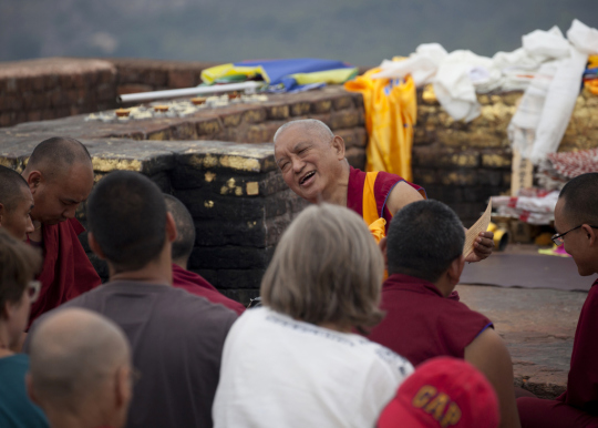 Lama Zopa Rinpoche teaching on Vulture's Peak, India, 2014. Photo by Andy Melnic.