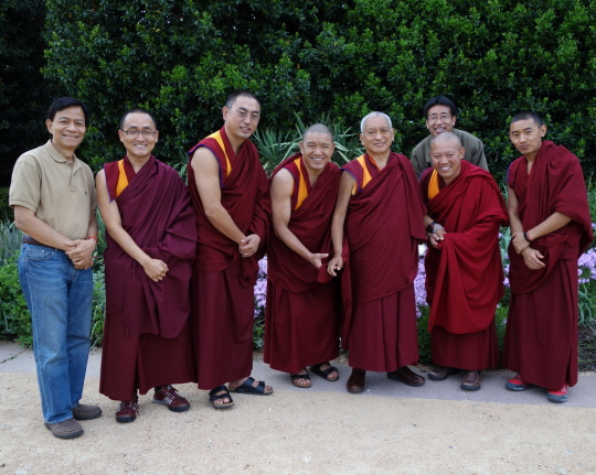 Lama Zopa Rinpoche with Geshe Gelek, Kadampa Center resident geshe; Geshe Tenley, Kurukulla Center resident geshe; Geshe Sangpo; Damcho, the translator; Rinpoche's attendants  Vens. Sangpo and SherabRinpoche's host Mr. Son Pham out for a walk in the park in Raleigh, North Carolina, US, May 2014. Photo by Ven. Roger Kunsang.