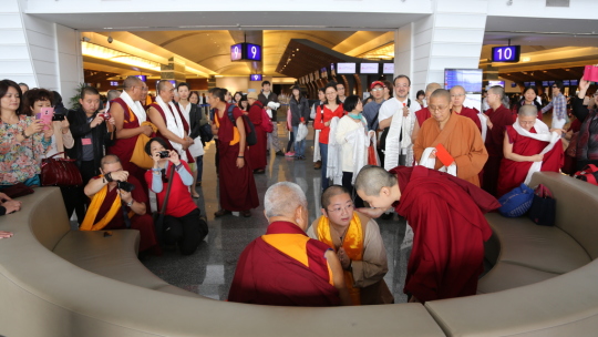 Lama Zopa Rinpoche before boarding flight to United States, Taipei, Taiwan, April 2014. Photo by Ven. Thubten Kunsang.