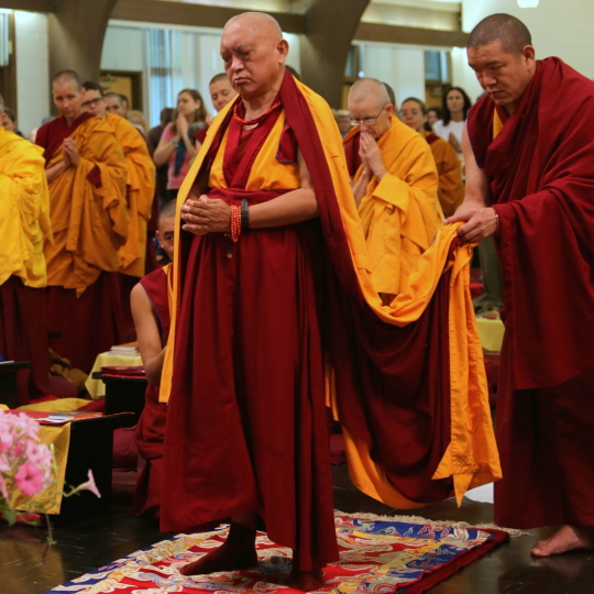 Lama Zopa Rinpoche doing full length prostrations at Light of the Path, Black Mountain, North Carolina, US, May 2014. Photo by Ven. Roger Kunsang.