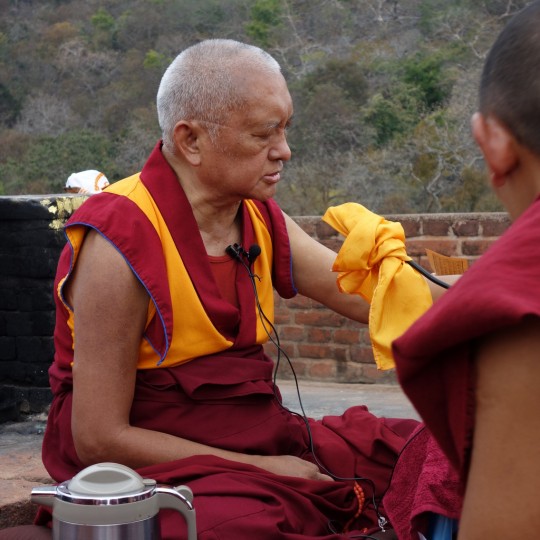 Lama Zopa Rinpoche on Vulture's Peak, Rajgir, India, March 2014. Photo by Ven. Roger Kunsang.