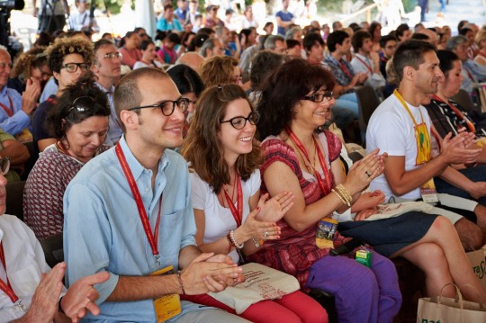 Audience members at His Holiness the Dalai Lama's talk at Istituto Lama Tzong Khapa, Italy, June 13, 2014. Photo by Olivier Adam.