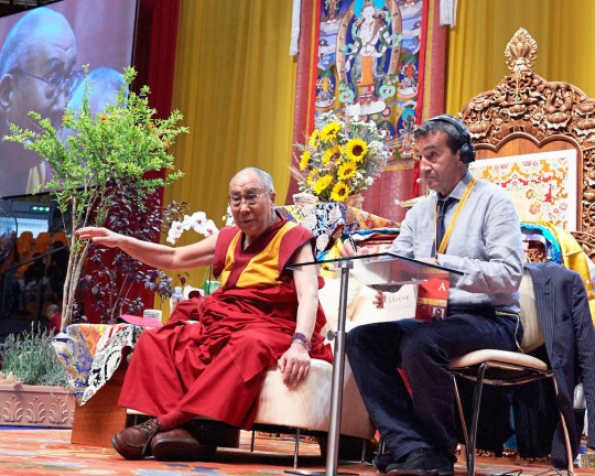 His Holiness the Dalai Lama during afternoon teaching with Fabrizio Palliotti interpreting, Livorno, Italy, June 15, 2014. Photo by Olivier Adam. 