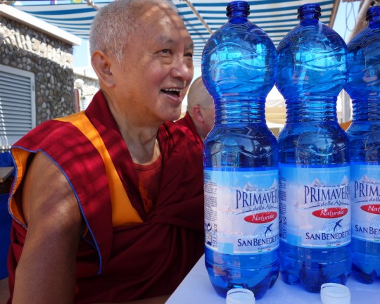 Lama Zopa Rinpoche blessing water to be offered to pretas at the beach, Italy, June 2014. Photo by Ven. Roger Kunsang.