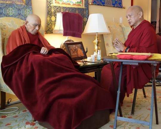 Lama Zopa Rinpoche doing prayers with Geshe Sopa Rinopche, Deer Park Buddhist Center, Wisconsin, US, July 20, 2014. Photo by Ven. Roger Kunsang.