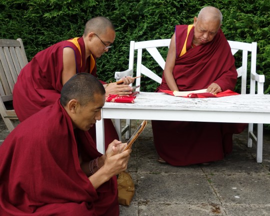 Lama Zopa Rinpoche with Vens. Sangpo and Sherab doing prayers for the future retreat center Land of Joy, UK, July 2014. Photo by Ven. Roger Kunsang.