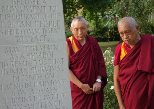 Lama Zopa Rinpoche with Geshe Tashi, resident geshe at Jamyang Buddhist Centre, visiting the the Tibetan Peace Garden next to the Imperial War Museum in London, UK, July 2014. Photo by Ven. Roger Kunsang.