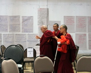 Lama Zopa Rinpoche arriving at the CPMT 2014 meeting for afternoon session on Day 2, Great Stupa of Universal Compassion, Australia, September 14, 2014. Photo by Laura Miller.