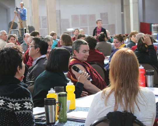 Reporting back after small group discussion on FPMT Education Programs, CPMT 2014, Great Stupa of Universal Compassion, Australia, September 14, 2014. Photo by Laura Miller.