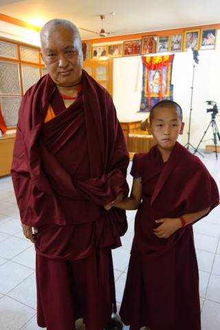 Lama Zopa Rinpoche with the incarnation of Ribur Rinpoche, Sera Je Monastery, India, Jan 2014. Photo by Ven Roger Kunsang